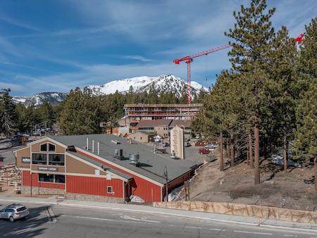 Mammoth Lakes Taproom & Eatery Building with the Snowy Mammoth Lakes Mountains in the Backdrop